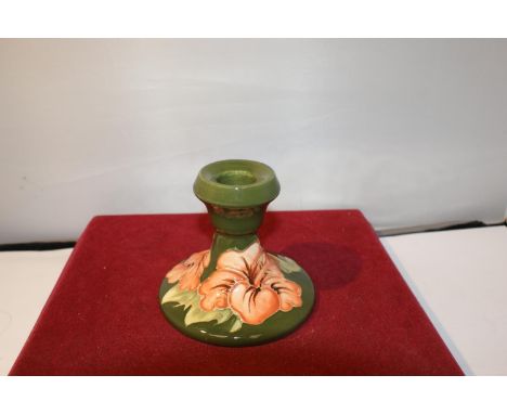 A MOORCROFT HIBISCUS CANDLESTICK 