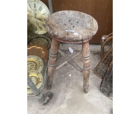 A VINTAGE PINE STOOL 