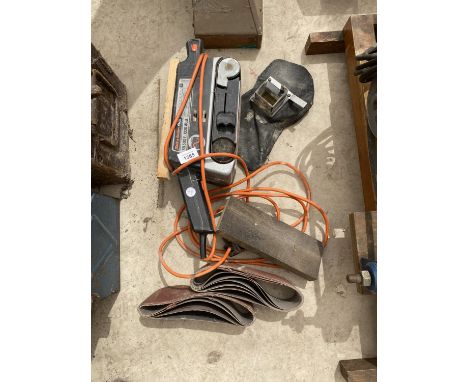 A BLACK AND DECKER ELECTRIC BELT SANDER 