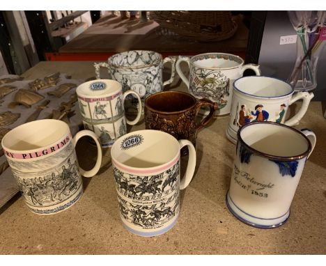 A COLLECTION OF CERAMIC TANKARDS 