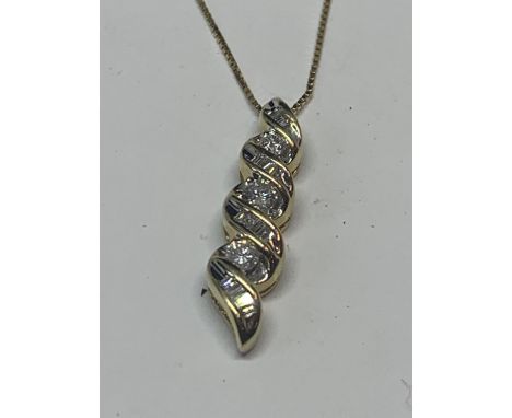 A 14 CARAT GOLD DROP PENDANT WITH APPROXIMATELY 1 CARAT OF DIAMONDS CHAIN LENGTH 45CM 