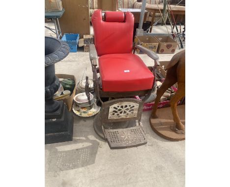 A VINTAGE RECLINING DENTIST CHAIR 