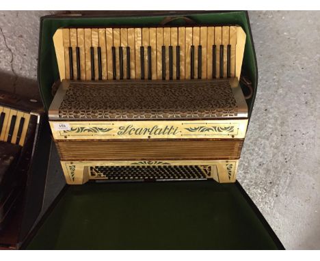 A  VINTAGE CASED SCARLATTI ACCORDIAN 