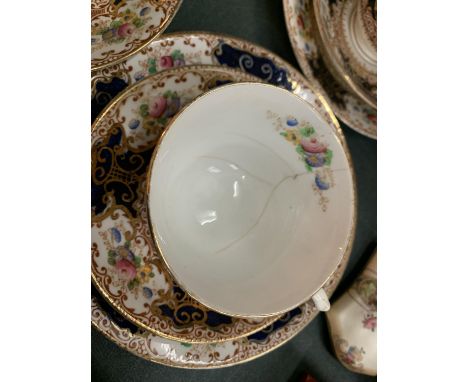A LARGE CERAMIC TEASET TO INCLUDE CUPS, SAUCERS AND PLATES 