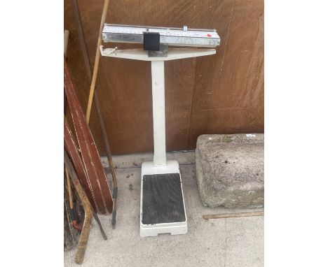 A VINTAGE SET OF PLATFORM SCALES 