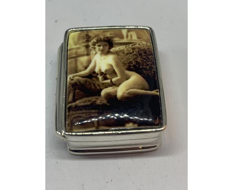 A MARKED SILVER PILL BOX WITH AN EROTIC DESIGN ENAMEL LID 