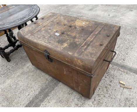 A METALWARE TRAVELLING TRUNK 