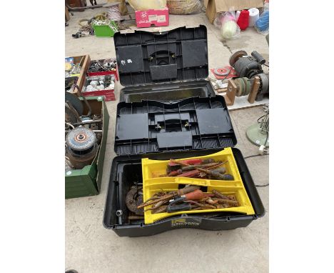 A PAIR OF PLASTIC TOOL BOXES WITH AN ASSORTMENT OF TOOLS INCLUDED 