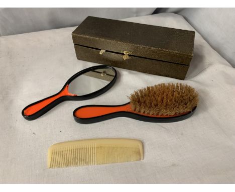 AN ART DECO BOXED BRUSH, MIRROR AND COMB SET 