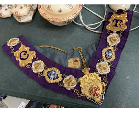 A MASONIC ORNATE COLLAR WITH BADGES ON A CHAIN 