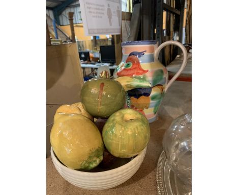 A CERAMIC FRUIT BOWL AND A LARGE COLOURFUL JUG WITH PARROT AND FLOWER DESIGN 