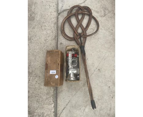 A MANUAL MEAT GRINDER AND A VINTAGE CARPET BEATER 