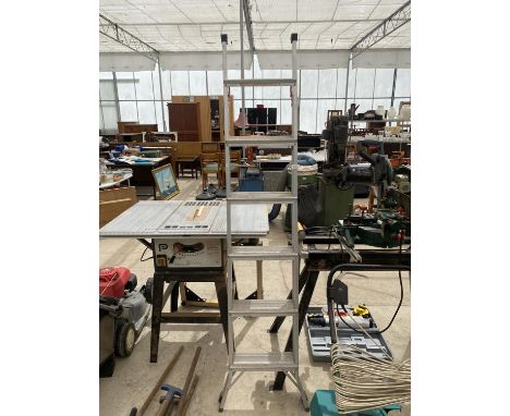 A SIX RUNG ALLUMINIUM STEP LADDER 
