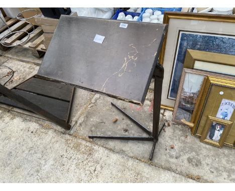 A VINTAGE WRITING STAND ON CAST IRON BASE 