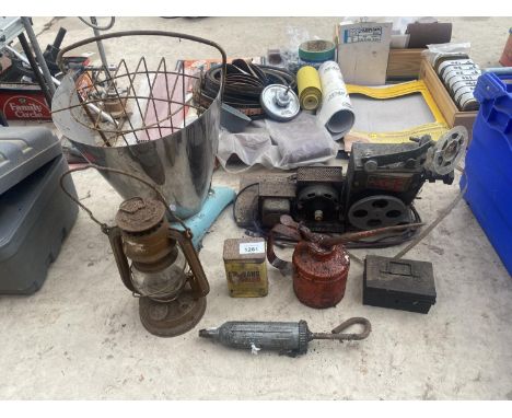 AN ASSORTMENT OF VINTAGE ITEMS TO INCLUDE A PARAFIN LAMP, OIL CANS AND A HEATER ETC 