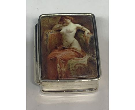 A MARKED SILVER PILL BOX WITH AN ENAMEL EROTIC DESIGN TOP 