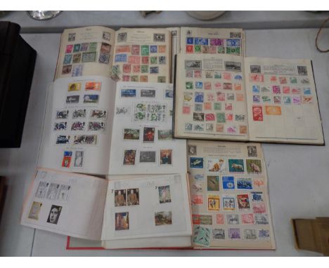 A COLLECTION OF SIX VINTAGE STAMP ALBUMS 