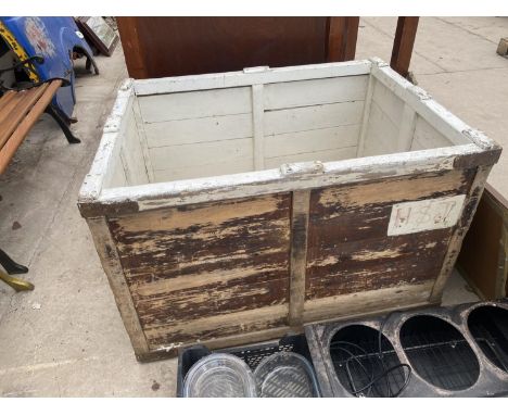 A LARGE VINTAGE WOODEN CRATE 