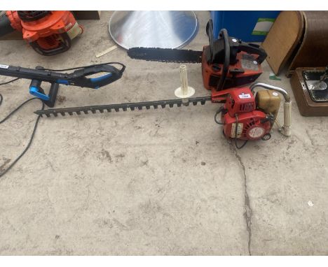 A PETROL SACHS DOLMAR CHAINSAW AND A PETROL HEDGE CUTTER 