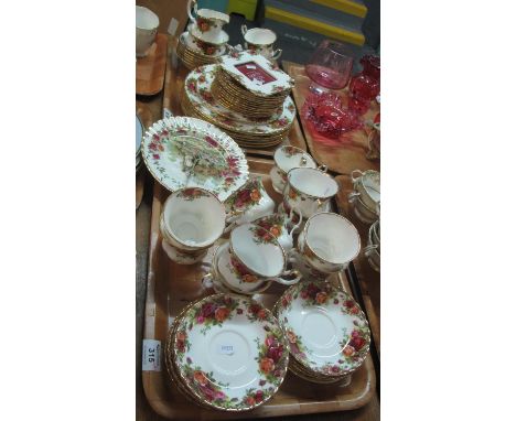 Two trays of Royal Albert Old Country Roses bone china items various to include cups and saucers, milk jug, sucrier, condimen