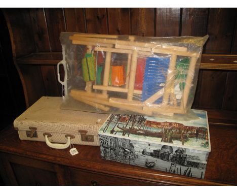 Tapestry frame vintage suitcase and two vintage biscuit tins.(B.P. 24% incl. VAT) 