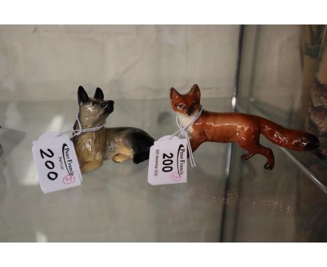 Beswick German shepherd, together with a Beswick study of a fox. (2)(B.P. 21% + VAT) The fox has some crazing but neither ite