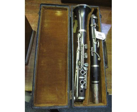 A Gerome wooden clarinet in appearing original fitted box. (B.P. 21% + VAT)  Length of Clarinet is 67 cm Approx.