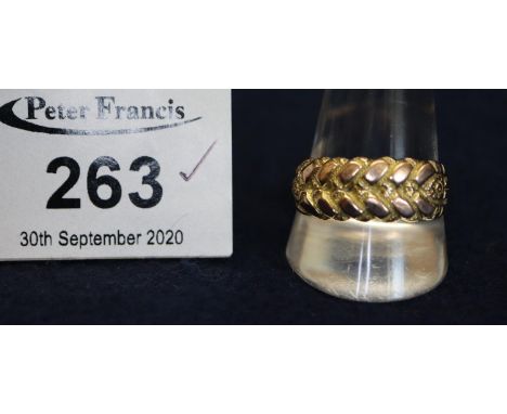 9 ct gold puzzle design ring  dress ring. 6g approx.(B.P. 21% + VAT) 