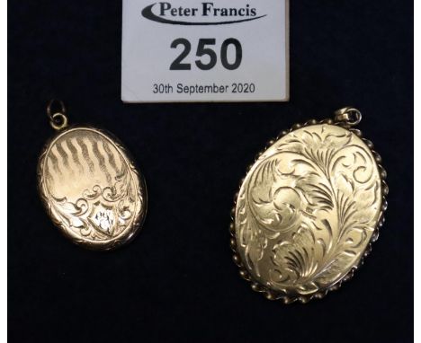 Two yellow metal engine turned and engraved lockets, one unmarked, one probably gold. (2)(B.P. 21% + VAT) 