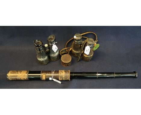 Two pairs of vintage binoculars (probably WWI period) and a black-finished, brass, two-drawer telescope. (3)(B.P. 21% + VAT) 