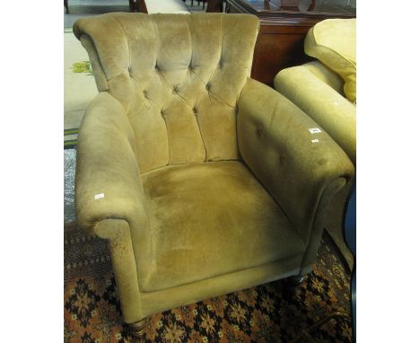 Early 20th century beige button back upholstered arm chair on turned supports and castors. (B.P. 21% + VAT)