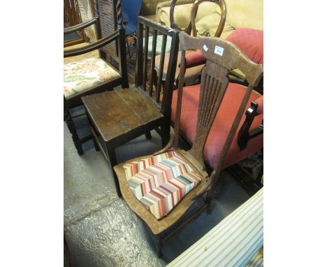 Low lyre backed nursing chair with tapestry seat and a late 18th century Welsh oak stick back dining chair. (2)(B.P. 21% + VA