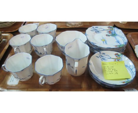 18-piece Melba bone china part-tea set on a white ground with Oriental landscape with sun and trees, to include 6 tea cups, 4