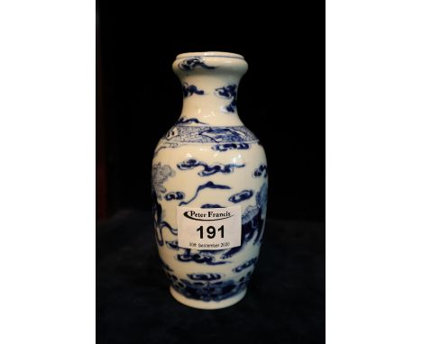 Small chinese blue and white porcelain baluster vase, decorated with Chimera amongst clouds. Four character Kangxi marks to b