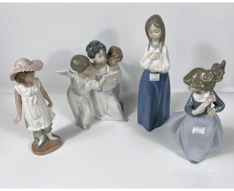 A Lladro group of 3 child angel singers; 3 Nao figures of children 