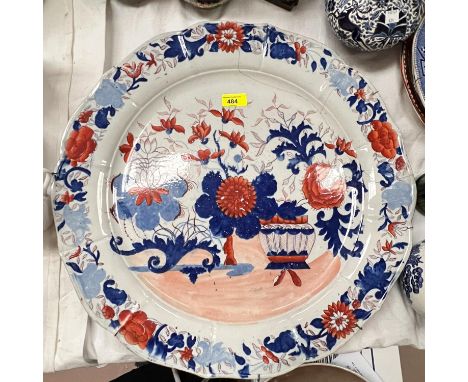 A 19th century British large ceramic wall plaque in the Imari pattern, diameter 51cm (cracks to border); other decorative wal