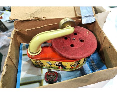 A vintage wind up tin plate Pixie Phone children's record player 