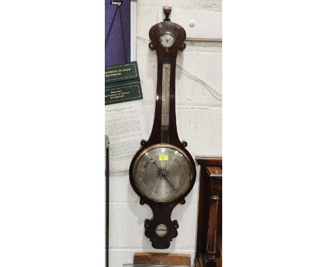 An early19th century mercury column barometer with thermometer in mahogany banjo shaped case 
