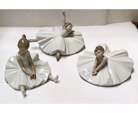 Three Nao girl ballerina figures; 2 Nao figures:&nbsp; boy angel with flute &amp; girl with puppy 