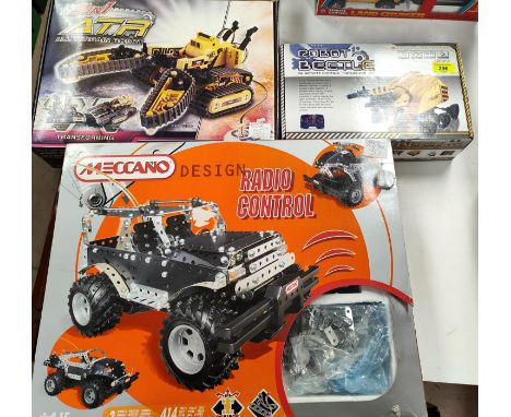 A boxed Meccano design Radio control set 8700 for construction, a boxed Remote control robot ATR 3in1 and a Robot Beetle remo