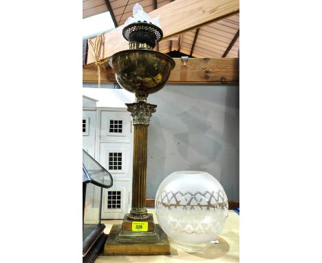 A Victorian brass Corinthian column oil lamp with frosted glass shade 