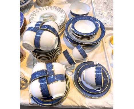 A seven piece part fish service; a Grosvenor china part blue and white tea service 