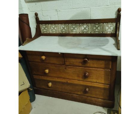 A Victorian stained wood washstand of 2 drawers with tile back and marble top 