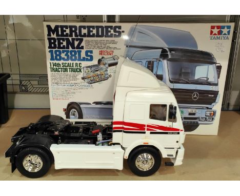 A Tamiya Mercedes-Benz 1838LS 1/14th scale RC Tractor Truck, built with original box including paperwork etc (from an estate 