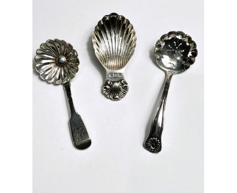 2 shell bowl hallmarked silver caddy spoons Exeter 1831 and Birmingham 1991; a hallmarked silver sifter spoon, Birmingham 190