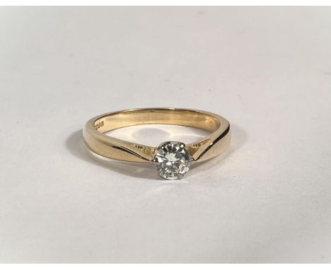 An 18ct hallmarked gold diamond solitaire ring, stone approx. 4mm diameter, 2.7gms size 'J' 