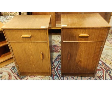 A pair of mid 20th century light wood bedside cabinets with single drawer and cupboard below, height 61 x depth 34 x width 38