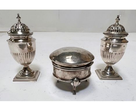 A pair of hallmarked silver classical pedestal salt and pepper pots on square stepped bases, Birmingham, (date worn); a small