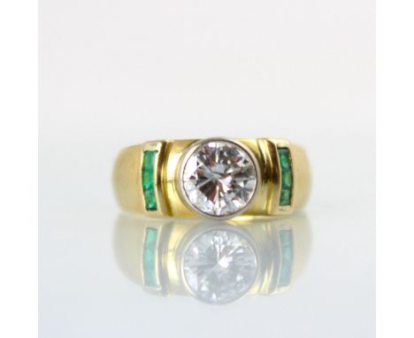 A bespoke diamond solitaire ring, the central round cut diamond within white metal raised rubover setting, with three calibre