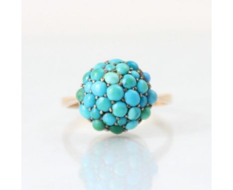 A 19th century turquoise cluster ring, the bombe head set with cabochon turquoise of various sizes, closed to the reverse, up